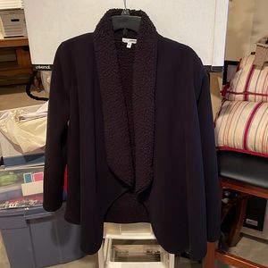 Black women’s coat. Faux fur interior.